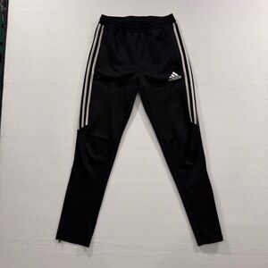 Adidas Kids Black Joggers with White Stripes, zippered pockets and zippered legs
